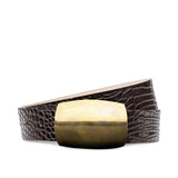 Belt with a brown crocodile textured strap and gold buckle 