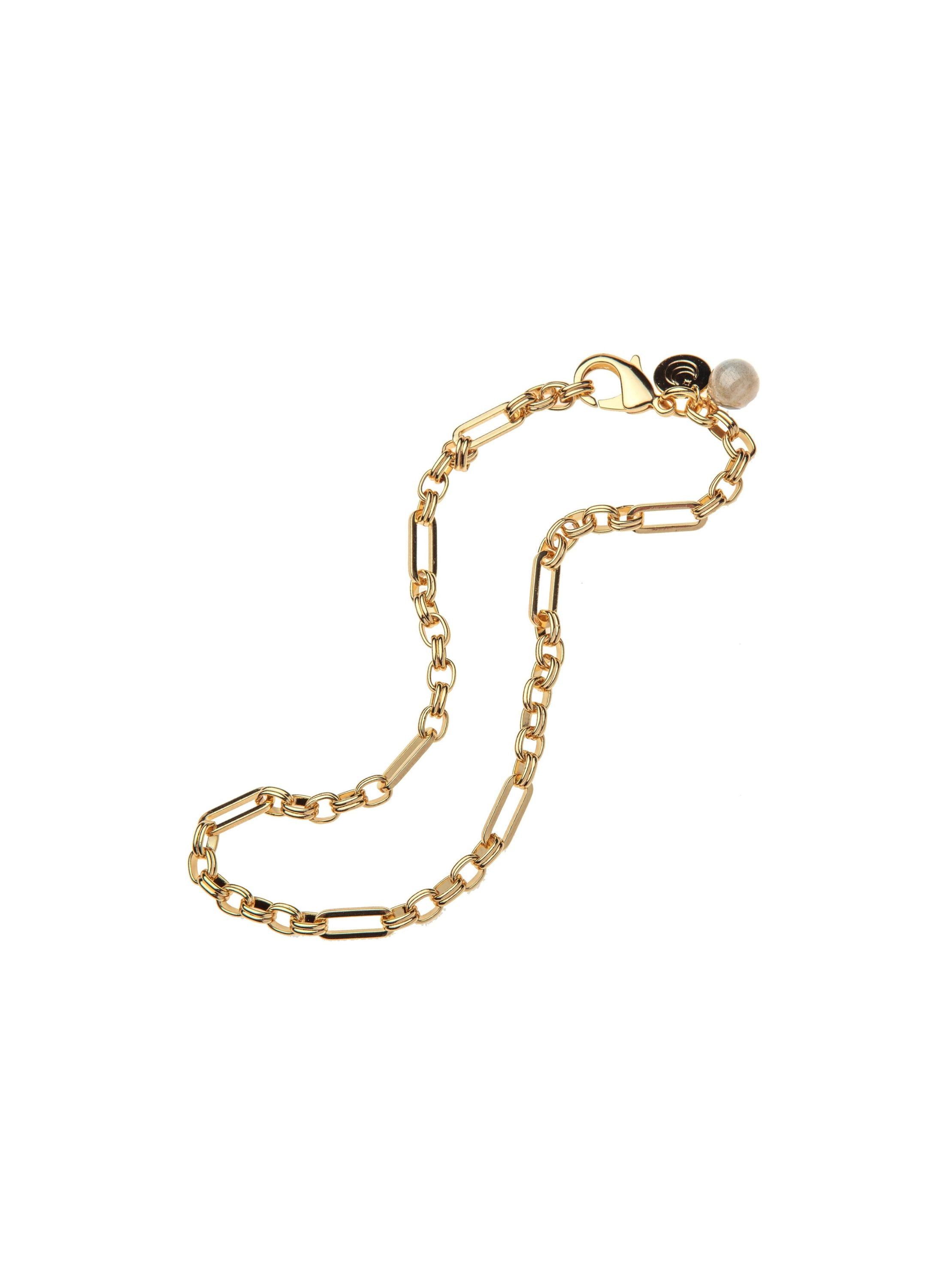Gold chain necklace with a small bead charm 