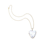 Heart-shaped pearl pendant on a gold chain necklace