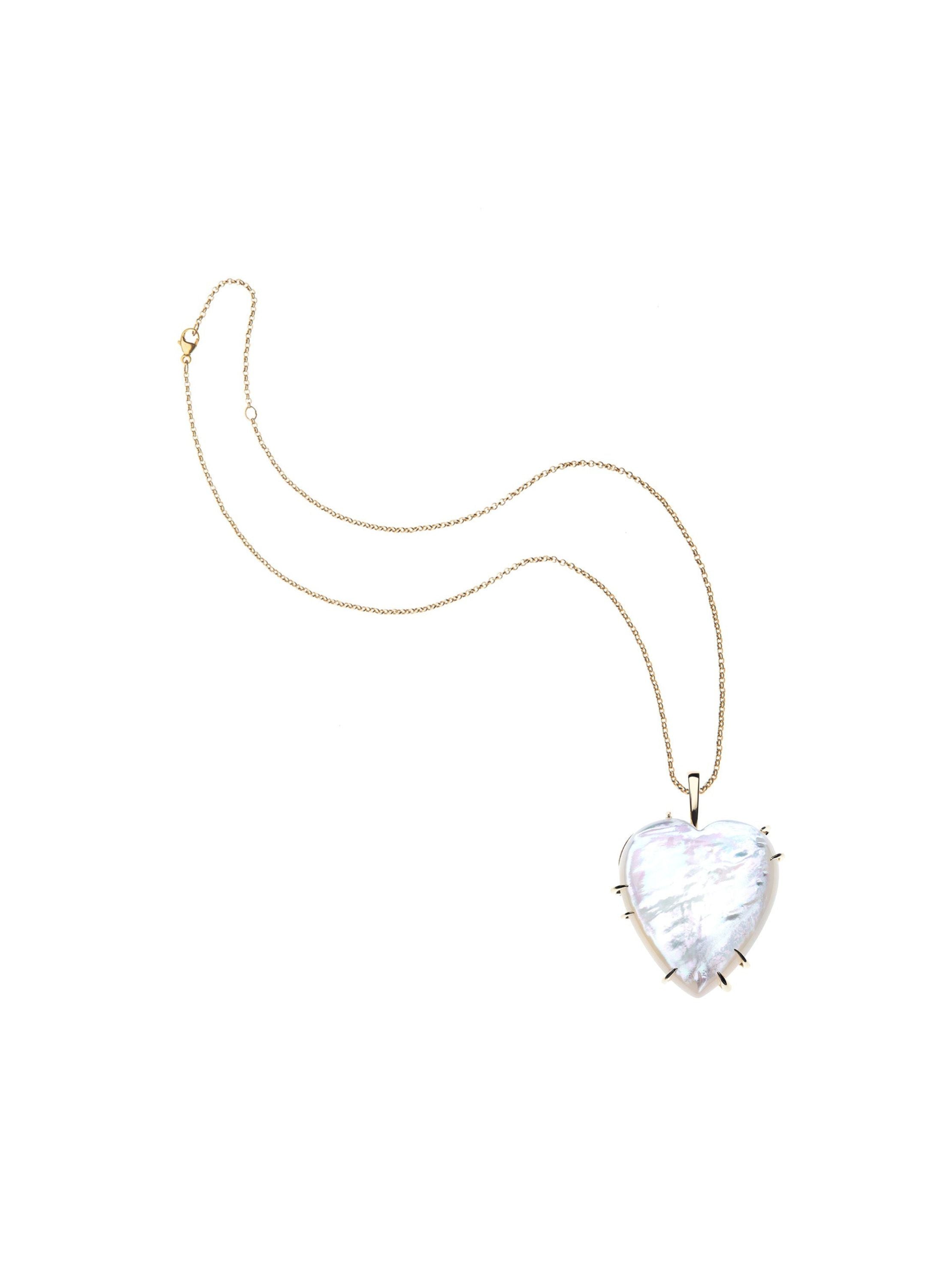 Heart-shaped pearl pendant on a gold chain necklace