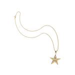 Gold star pendant on chain necklace