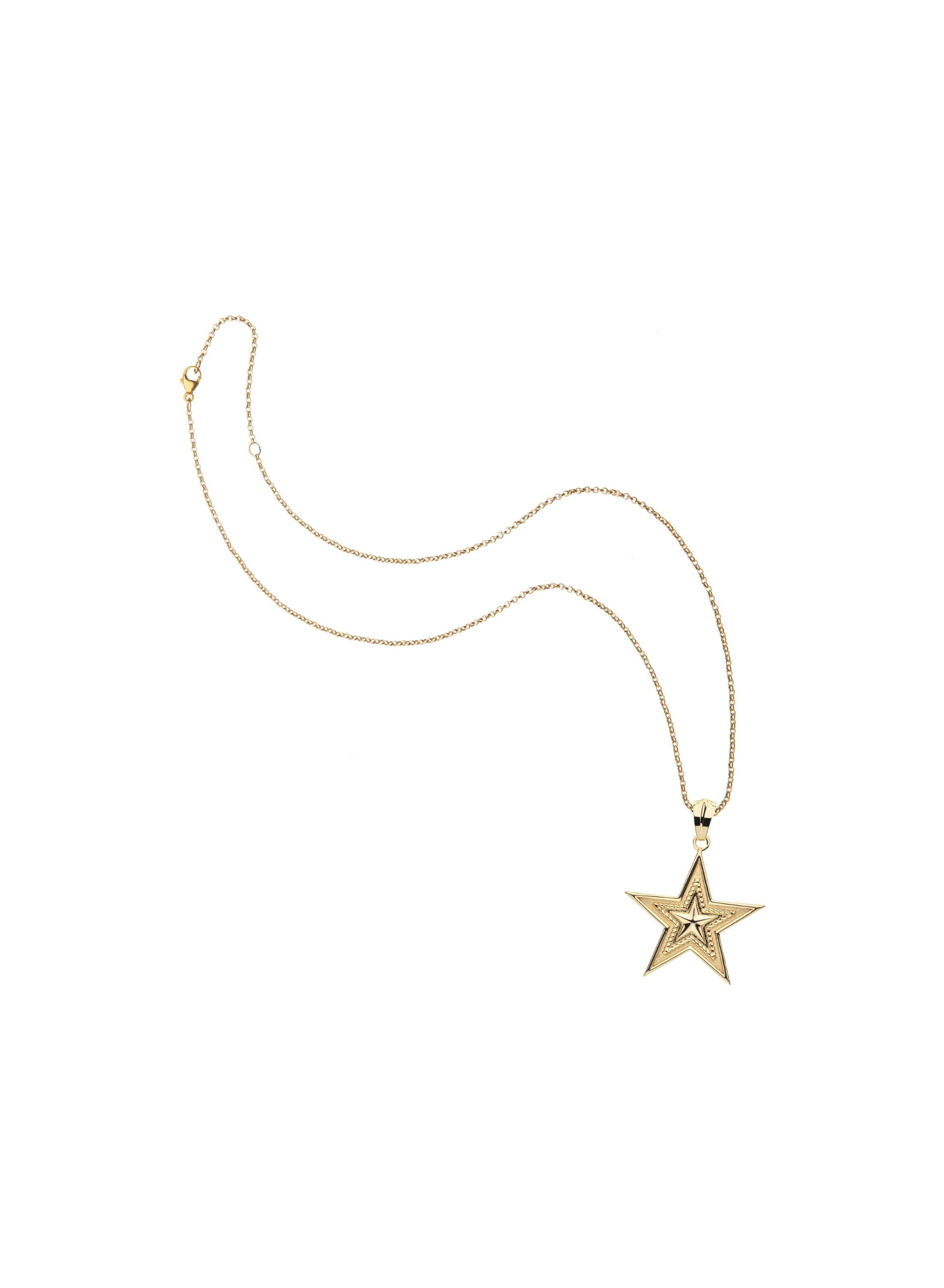 Gold star pendant on chain necklace