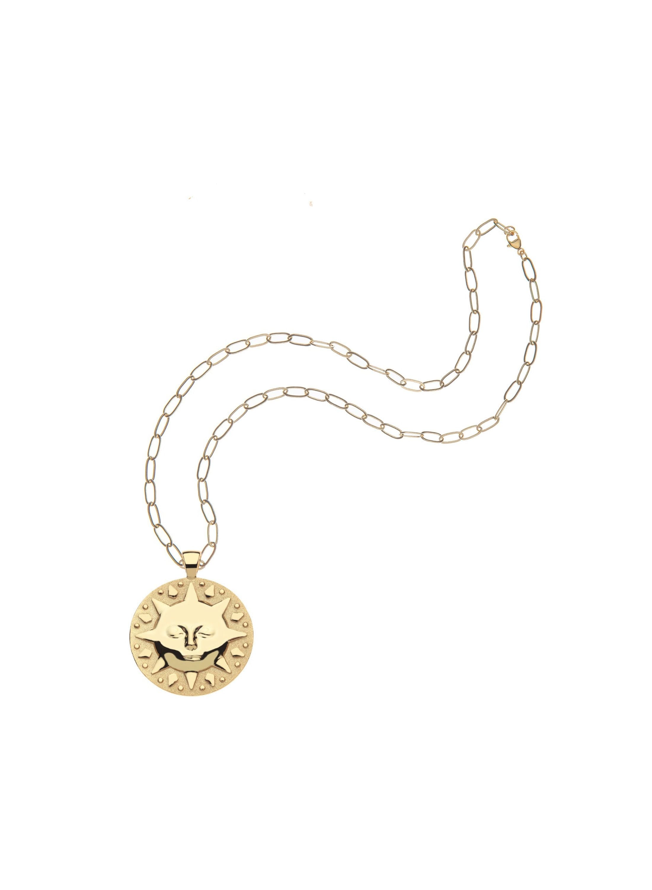 Gold necklace with a round sun pendant